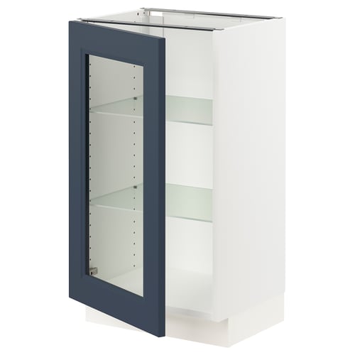 A white SEKTION kitchen cabinet with blue glass doors and adjustable shelves.