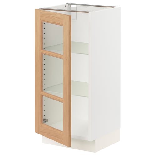 Ikea SEKTION kitchen cabinet with glass and oak door, white and wood tone colors, rectangular shape, modern design.