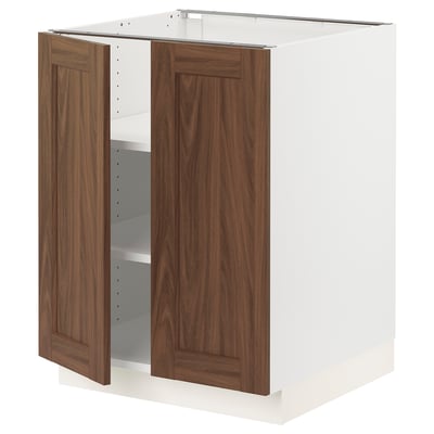 Open ikea SEKTION kitchen cabinet with white frame and walnut doors, displaying shelves inside.