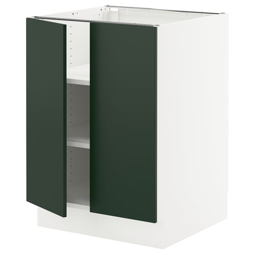 SEKTION kitchen cabinet in green with two open doors revealing adjustable shelves, white base.