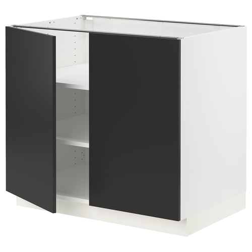 A modern ikea SEKTION kitchen cabinet with matt black nickebo fronts. It has two doors and adjustable shelves, supported by a sturdy white frame.