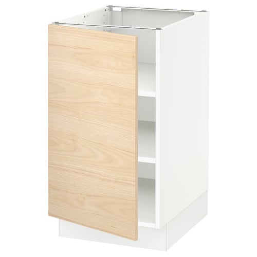 An ikea SEKTION kitchen cabinet in white with a light ash wood door.