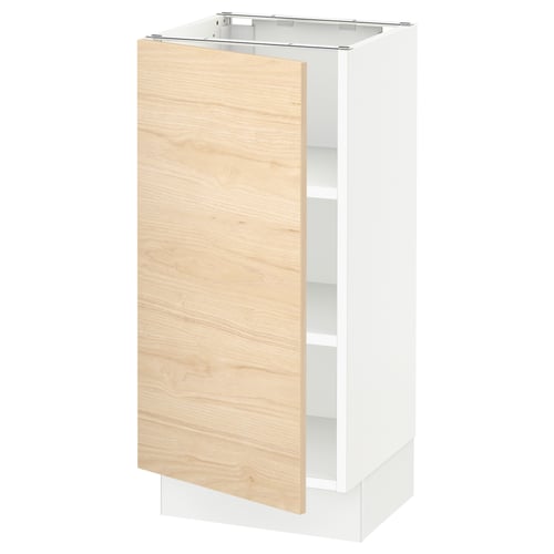 A SEKTION kitchen cabinet with a light wood door and white base. The modern design offers adjustable shelves.