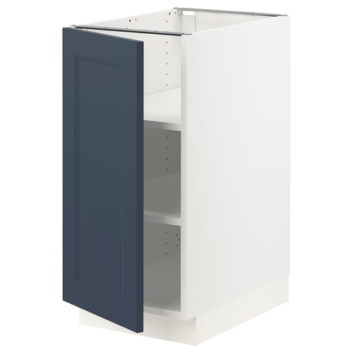 Blue kitchen cabinet with adjustable shelves and white frame.
