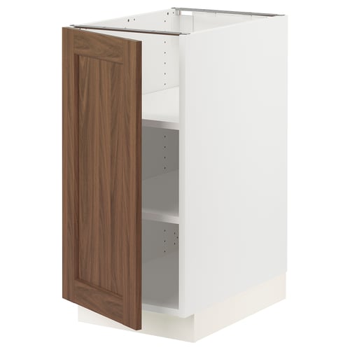 White wooden kitchen cabinet with shelves.
