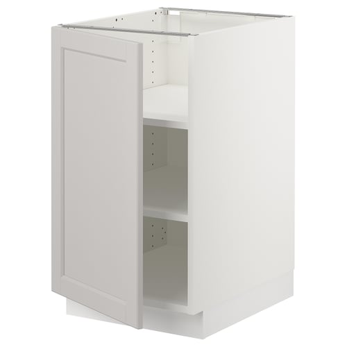 A white SEKTION kitchen cabinet with one adjustable shelf and a door thats not mounted, revealing an empty interior.