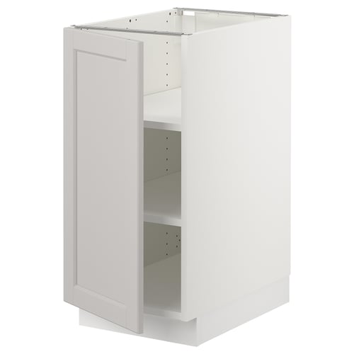 White SEKTION kitchen cabinet with left-opening door, bevelled edges, and adjustable shelves.