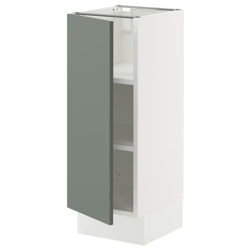A white cabinet with a gray-green door from IKEAs SEKTION kitchen system. The cabinet has adjustable shelves and a door that can open left or right.
