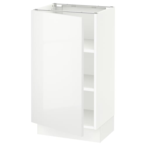 A high-gloss white SEKTION kitchen cabinet with adjustable shelves and a door that can open either left or right.