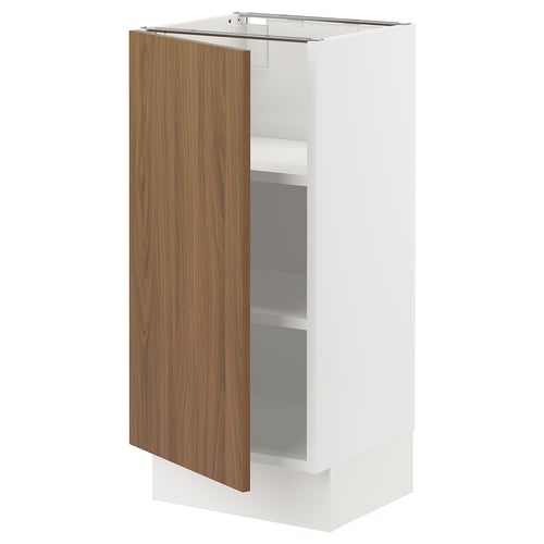 White kitchen cabinet with modern, walnut-colored door, adjustable shelves, and soft-closing hinges.