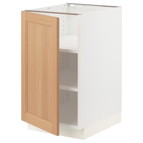 SEKTION kitchen cabinet in white and light wood, open door, adjustable shelves. Modern, minimalist design with sturdy frame.