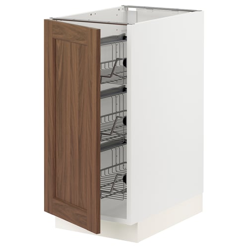 White SEKTION kitchen cabinet with walnut door and wire drawers.