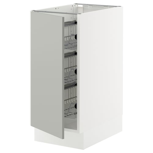 A white SEKTION kitchen cabinet with wire shelves.