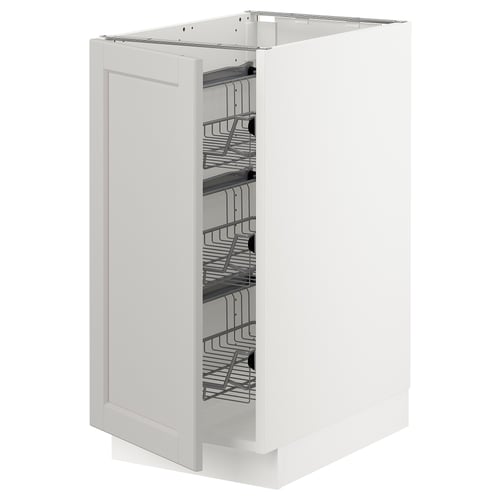 White SEKTION kitchen cabinet with pull-out wire baskets, bevelled doors.
