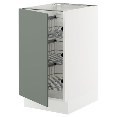 A modern kitchen cabinet with a grey-green door. It has wire racks inside for storage and is part of the SEKTION kitchen system.
