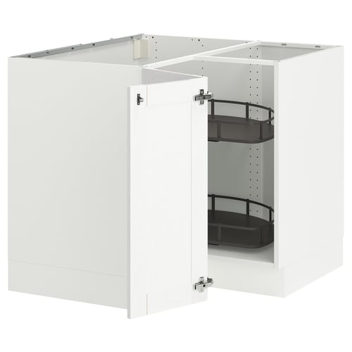White corner cabinet with pull-out shelves.