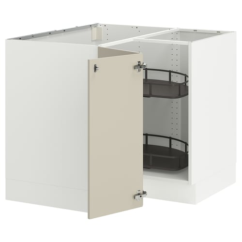 A white ikea SEKTION kitchen cabinet in beige with pull-out shelves.