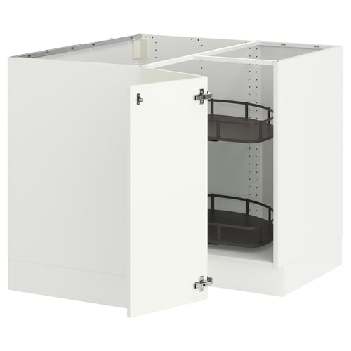 A white SEKTION corner base cabinet with a pull-out carousel storage system.