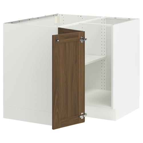 A white SEKTION kitchen cabinet with a walnut wood door.