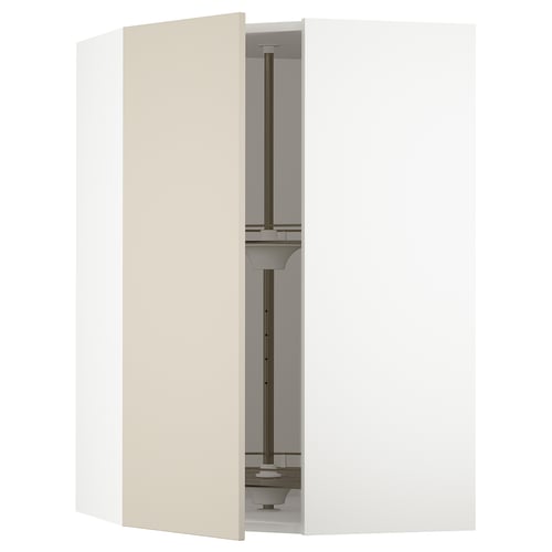 A beige SEKTION kitchen cabinet with a door open, revealing adjustable shelves and a carousel for stored items.