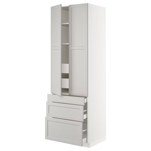 White SEKTION cabinet with classic design, drawers, shelves, and adjustable interior. Sturdy frame, smooth drawers.