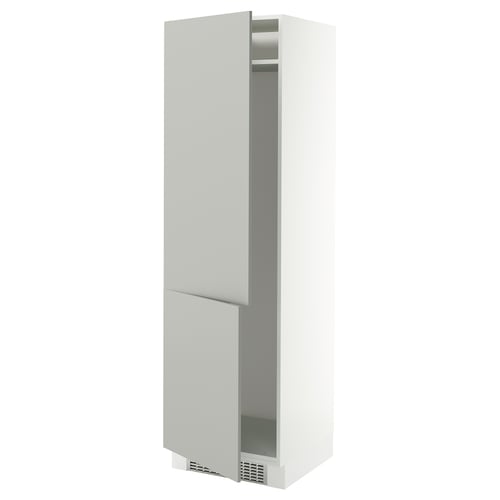 A white SEKTION cabinet with a single open door revealing shelves. The cabinet is tall and rectangular, providing storage space.
