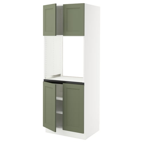 A tall white kitchen cabinet with 4 green recessed-panel doors.