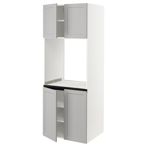 White kitchen cabinet with two open doors by IKEA.