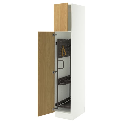 A tall white storage cabinet with oak doors, one open revealing adjustable shelves and hanging loops inside.