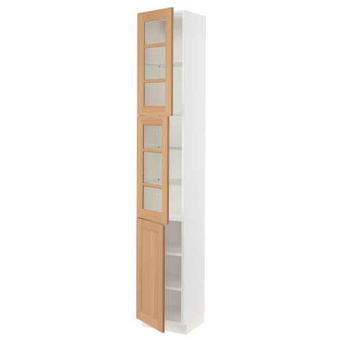 Oak doors, white frame kitchen cabinet with glass doors and shelves.