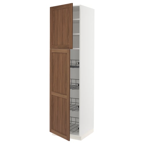White kitchen cabinet with walnut doors open, showing wire shelves.
