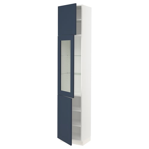 A tall white storage cabinet with blue doors and a glass panel, part of the SEKTION kitchen system from IKEA.
