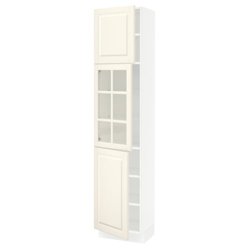 An off-white, tall kitchen cabinet with glass doors and adjustable shelves.