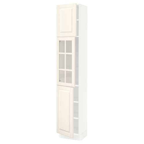 An off-white, tall kitchen cabinet from the SEKTION series by IKEA. It a mix of solid and glass doors with adjustable shelves.