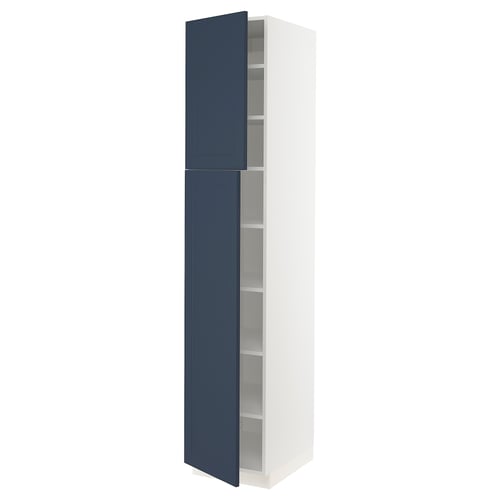 A white SEKTION kitchen cabinet with blue doors. It has a rectangular shape with adjustable shelves inside. The doors have a snap-on hinge design.