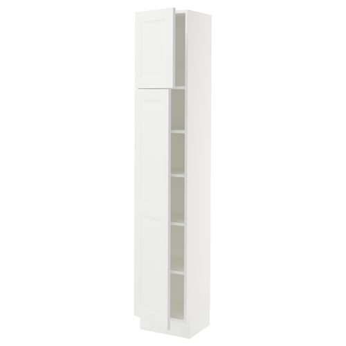 A tall white SEKTION kitchen cabinet with adjustable shelves and a door opening to the right.