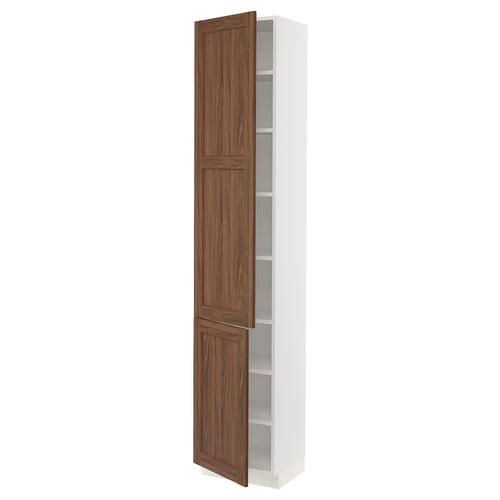 A white SEKTION kitchen cabinet with walnut-toned wooden doors, featuring adjustable shelves.
