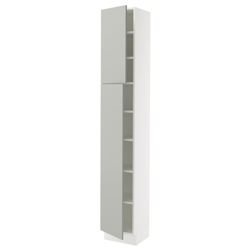 A white SEKTION tall cabinet from IKEA, featuring adjustable shelves and a sleek modern design.