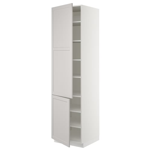 White kitchen cabinet, tall and narrow with a traditional design, two doors, adjustable shelves.