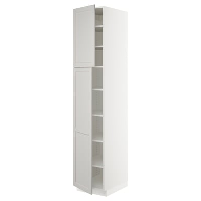 White SEKTION ikea kitchen cabinet, tall with doors & shelves.