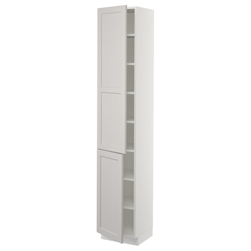 A SEKTION white kitchen cabinet with adjustable shelves and hinged doors.