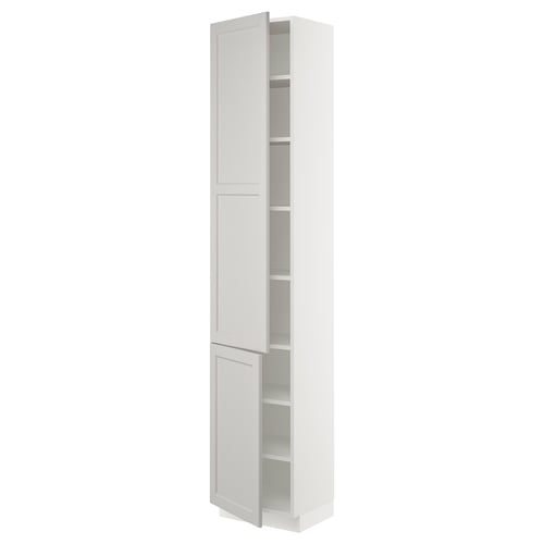 White SEKTION kitchen cabinet, tall with adjustable shelves, bevelled edges.