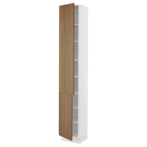 A tall white SEKTION cabinet with two wooden doors and multiple shelves inside. The doors have a smooth, modern walnut finish.