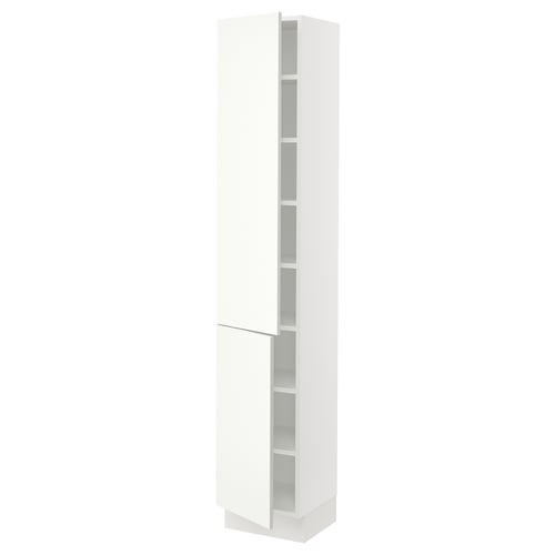 A tall white SEKTION cabinet from IKEA. It has sleek modern lines with a glossy finish, including glass shelves inside.