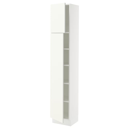 A white SEKTION kitchen cabinet with a slim design featuring an open door, revealing adjustable shelves inside.