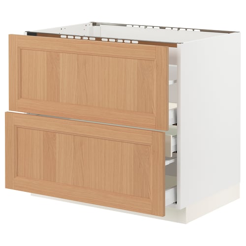 SEKTION kitchen unit with oak drawers and white base, modern design.