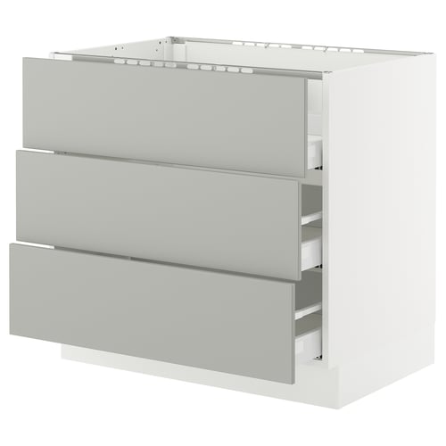 Ikea SEKTION white kitchen cabinet, light grey drawers, rectangular shape, modern clean design.