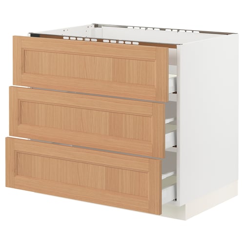 SEKTION natural oak kitchen cabinet. Three open drawers, sleek design, white structure.