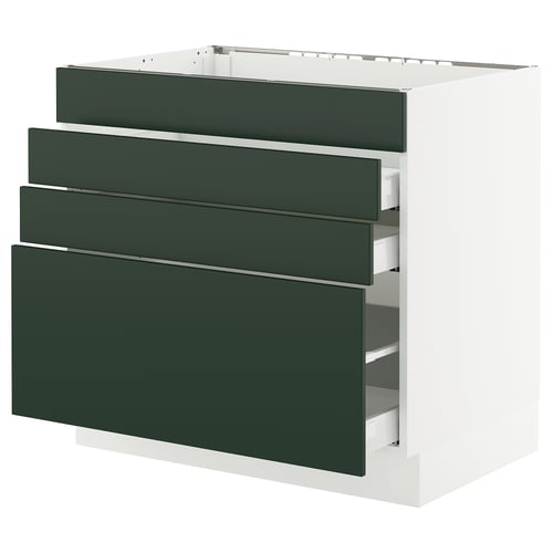 SEKTION kitchen cabinet with green drawers.