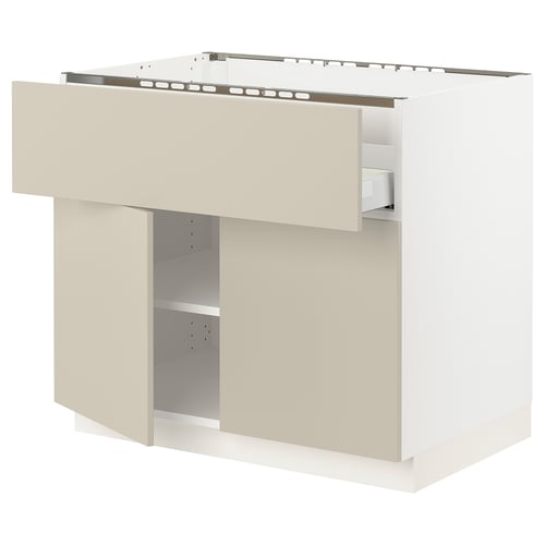 A beige SEKTION kitchen cabinet with a smooth surface, featuring a shelf and metal hardware.